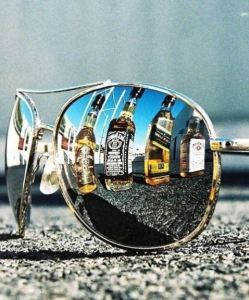 Ermilia~alcohol-in-sunglasses-